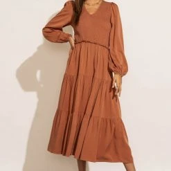 LUMIERE PREORDER - Smocked Tiered Midi Dress In Rust New Arrivals 18 LUMIERE PREORDER - Smocked Tiered Midi Dress In Rust New Arrivals