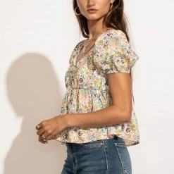 MILLIBON POLYMOND DK INC Alaina Peplum Top