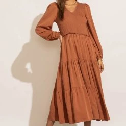 LUMIERE PREORDER - Smocked Tiered Midi Dress In Rust New Arrivals 17 LUMIERE PREORDER - Smocked Tiered Midi Dress In Rust New Arrivals