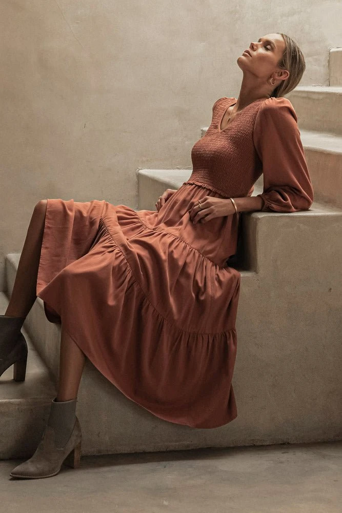 LUMIERE PREORDER - Smocked Tiered Midi Dress In Rust New Arrivals 4 LUMIERE PREORDER - Smocked Tiered Midi Dress In Rust New Arrivals