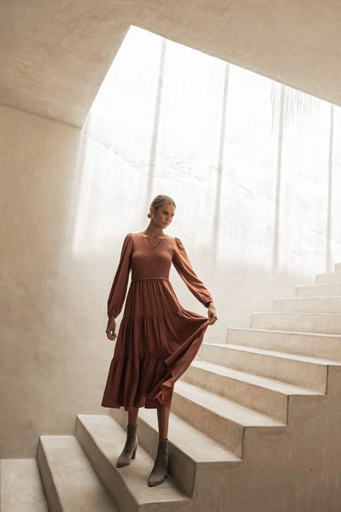 LUMIERE PREORDER - Smocked Tiered Midi Dress In Rust New Arrivals 13 LUMIERE PREORDER - Smocked Tiered Midi Dress In Rust New Arrivals